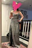I bought this to wear for New Years and a wedding in my usual size (xs). The dress fits exactly and loosened up very slightly after just trying it on. I wasn't sure if it would be too tight based on other reviews but this will work for me. If you want more wiggle room or don't want it so form fitting then I would order a size up. Ill also have to get this hemmed bc even with my highest heels its very long. Color looks the same as the website (more gunmetal then a white based silver) and the quality is pretty good for the price. Its fully lined so I'm not worried about any undergarments showing through. - Erica R.