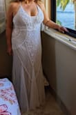 This dress is beautiful. Had a beach wedding and was lightweight and stunning!! Felt like a bride!! - Dwayne P.