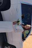 The dress was gorgeous! I was scrambling  to find something for our civil ceremony. I did order a Large as opposed to an XL. It was very flattering for my curvy pear shape. 
I got so many compliments on it! It's very elegant, yet playful and sexy. - Monica M.