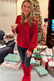 This sweater is a beautiful, vibrant red. It was perfect for the holiday season! Length wise, the sweater was perfect, not oversized, but not cropped either. It is a bit wide which made the small I ordered feel big, but because it is a sweater I didn't mind the loose fit. It's also very warm and perfect for cold winter days. - Kristen S.