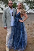 I wore this dress to a destination beach wedding and got SO MANY compliments! I felt really pretty and fancy, and comfortable. I had to hem it since I'm only 5'3", and wore wedges with it. The organza layer did come out of the seam when I pulled the top down and tried to adjust it so it needs to be repaired now. I think it's just delicate so you need to be careful with it. Overall, I love this dress! - Andi B.
