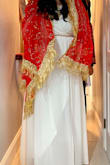 Bought this dress for my wedding that was planned in one week. It arrived SO QUICK and was so simple, but also so ethereal and elegant. I dressed it up with a belt (also bought from Lulu's), a lot of gold jewelry and my mom's wedding headscarf. Couldn't have been happier with how it turned out. I'm a big girl. Been wearing a L of late,  but the M fit just fine - even with my big tatas. I did wear a camisole underneath to hide my cleavage and tights to hide my legs. But for summertime, I dont plan to wear tights as that will make it a bit more summery. - Farah M.