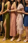 The color and the subtle pattern is cute and suited my skin tone (olive). Plus it has pockets!! However, the fabric was a bit on the thinner side and also super wrinkly. The dress itself was a little long for a midi size but still above the ankles. Nice for a summer wedding! - Jenn C.