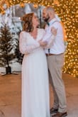 This dress was so much more than I expected and absolutely perfect for our big day!! Fit around the waist was true to size. Dress is very long and required alterations ( I expected this due to multiple other reviews reporting the same thing). The cuffs were also taken in a bit for a slimmer fit at the wrist.
I was truly nervous ordering a wedding dress online but so very glad I did. Dress does not look cheap, nice material, comfortable, and the back is absolutely my favorite part!! - Heather C.