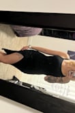 I had heard to size down as it is very stretchy but went against my better judgement and stuck with a small. It still fits great but almost wish I rocked it with the XS just to get a little more sexy right look especially for the waist and chest area. But overall absolutely love and feel so sexy in this dress! - Erica R.
