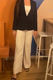 I paired this jumpsuit with a blazer and it was perfect for my business event. It is trendy and stylish, making me stand out amongst the other typical business outfits. It ran a little tighter on the length, but I am 5'10 and have longer legs. If you are on the fence about getting it, I would go for it! - Melia S.