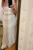 Dress fits great, looks perfect with Spanx under it (none shown in picture). Beautiful material with a sheen to it. Stays up great at the top, no bra needed. Came with nice dress garment bag. Purchased veil and sash on amazon. I tried on many dresses without finding ones I loved. I began to lose patience and time was slipping away. Shipped fast and was everything I could have hoped for. - Lacie S.