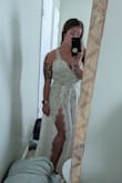 Nice quality, heavy dress. It comes with a nude liner attached (think swimsuit style). Very long if you're short but that's to be expected. - Nicole F.