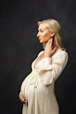 Love this dress! The satin photographs beautifully. It was the perfect choice for my maternity photo shoot! - Krista