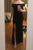 Wore this to a black-tie Christmas dinner and it was a huge hit. I gambled with ordering a small, and with the stretch in the fabric I just made it. It hugged my hips and waist perfectly with no gap or slipping up top, though I could only fit a stick-on bra (bustier ladies be aware). I did struggle a little getting the wrinkles out of the fabric, so plan accordingly ahead of your event. Can't wait to wear this again! - Karlin Y.
