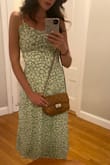 This dress fit like a glove and hugged in all of the right places. It's a perfect summer dress and could be more casually or dressed up for a more formal occasion. - Delia O.