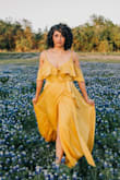 Bought this for a photoshoot and loved how flowy it was! The top is a little loose but it has a button that helped secure it so it wasn't an issue! - Dianna V.