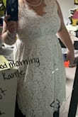 This is a gorgeous dress. Beautifully made, excellent quality lace. Gorgeous! Alas, wouldn't zip over my boobs. - Anna P.