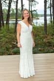 I LOVED this dress for my wedding! From the moment I tried it on it just felt "right". Super comfortable, very low maintenance which is what I was looking for for my outdoor, camp wedding. I did have to spend triple the cost of the dress to get it altered (it was WAY too long for me and my 1.5" heals block heals), and shoulder straps were taken in, but overall worth it. I got so many compliments! - Lee W.