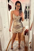 I am 5'7" 143 lbs the dress is medium and l Love how it fits - Jennifer R.