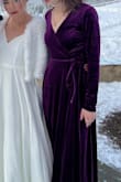 Beautiful color, beautiful material, beautiful everything. It is a bit heavy, so it kept me warm for my sister's outdoor wedding. It's also long, I'm 5'9" and it was a little too long but was fine with heels. An XS would have fit me better, but the small worked just fine. All in all, I love this dress!! - Willow H.