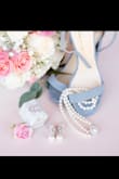 I got these as my "something blue" to wear for my wedding ceremony in a few months. The color is very pretty in person, and they are surprisingly not uncomfortable (and that's coming from someone who NEVER wears anything except sneakers). I ordered my usual size and they worked just fine. I will definitely be ordering more colors of this shoe because I like them so much! - Brya D.