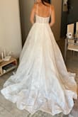 This dress is amazing. The fabric, the color, it fits my body just perfect! The tails is long but it looks flawless with the hole dress. - Alexaris M.