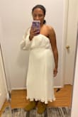 I love the dress! I tried it on and immediately thought it was beautiful! However the top of the dress is loose on me., but that's nothing some double sided tape won't fix. That's most likely because I got a size L but if I got the medium I would not have been able to zip the dress up. Speaking of the zipper, that's the main issue as it's very difficult to zip up and down once it gets to the middle part. And I don't want to pull too too hard because I'm afraid that I'll break the zipper! All-in-all it's a beautiful dress and I just might keep it. - Taylor M.