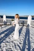 I was in the search for a dress that was simple and elegant for our small wedding ceremony, something comfortable and hugs you in all the right places making the dress flattering. I loved this dress and I was so happy with the way it fit! Stretchy material under the lace. Very comfy! - Kate D.