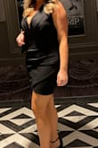 The material is stretchy but has enough compression that it keeps you sucked in a little. It's more low cut than I thought it would be but it worked for the event I was going to. - Ashley C.