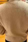 I really do love the style of this sweater, but I got it to wear for Christmas and after one wear it had a bunch of loose threads and was pilling (little fuzz balls). I didn't expect this to happen without even a wash yet. Disappointed in the quality! - Evelyn F.