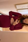 I love the dress! I'm pregnant and it's cute, not too firm fitting but compliments my shape. The slit normally would be the perfect length but being pregnant its a little high, still love it and I can get away with wearing it at work. - Ashley L.