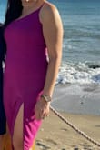 FITS AMAZING!!! Very comfortable, the color is gorgeous, nice stretchy material, the slit is perfect and sexy. and the adjustable straps are very convenient. I got so many compliments about how it fits, the color, the asymmetrical design. - Luz D.