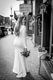 I'm not gonna lie, I'm a plain Jane when it comes to my dresses. I like the structure of a dress to make a statement rather than the intricate details, so this was a no-brainer for our micro wedding. It was a little loose in the chest because I have to order a larger size to accommodate my relative (dump truck)
A visit to a good tailor to take in the shoulders and attach the lining took this dress from looking nice to having that subtle wow factor I wanted. - Jenny B.