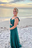 This dress was so beautiful, affordable and arrived quickly. Exactly as described, and the size I bought fit perfectly. I did have to take the straps up a tad just so they wouldn't keep falling. Comfortable and I got lots of compliments on it! - Chelsea S.