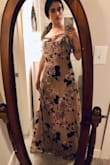I am usually between a small and a medium because I have a small chest and waist but wide hips. When I ordered it only the medium was available, but I probably would have ordered a small normally. Due to the way it fits, I don't know if a small would have fit my hips. It's not a stretchy fabric. I'm keeping and planning to alter it by taking it in at the waist for a more flattering shape since it's loose in that area. Another plus is that with my heels, I don't have to hem it, it's the perfect length! I purchased it to be maid of honor at a wedding, the bride is pleased. - Renata G.