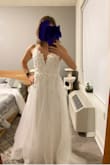 It's a nice dress, however, it had some issues with a zipper, was hard to zip because the fabric would stick inside. Quality was ok, not bad, not great. It was not very nice for me, I am returning it because it does not fit nicely. - Olesya P.