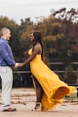 So lucky to have gotten this dress when it was restocked! It fit perfectly, no bra (34 D) short and thick! Perfect for engagement pictures! - Remi O.