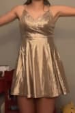This one is cute but is super short. Extremely shorter than all of the other dresses I ordered. the material is also super itchy and I had to return it. - Kelsi N.