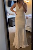 After hating every dress I tried on at David's Bridal, I looked on TikTok for some wedding dress inspo and found a lot of great reviews for Lulus new wedding collection. I was nervous to buy my wedding dress online. I ordered 5 dresses (all around $100) and tried them on at home. I fell in love with this dress. It fits amazing and is beautiful on me and very flattering for my figure. You absolutely cannot beat this price. I probably will not need any alternations which is great, and it's light and extremely comfortable. If you are considering getting your wedding dress from Lulus, this is your sign! - Katie T.