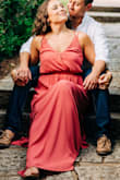 I purchased this dress for my engagement pictures and it is still to this day one of my absolute favorite purchases. I love EVERYTHING about this dress! I wore it with leather sandals and although it is longer, it still didn't look too long. I love the slit in the legs and the back!! Great fabric and even when it was 90 degrees and humid, it didn't show sweat marks. - April L.