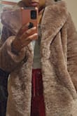 This fur coat is gorgeous, I'm so happy I bought it, I did size down to a small, and there was still a lot of room, it does run large , thanks Lulus - Peggyan L.