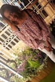 I like the versatility of this off the shoulder too. I can wear on my shoulders for work clothes then off for fun.

I wish it slightly longer. I have long stem Nd the sleeves git. The body of the shirt doesn't appear crop but you must wear it as such - Darche B.