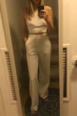 Super cute pants. I sized down from what the fit finder told me to get and glad I did- these fit perfectly. Length is great and I'm on the taller side. The material is nice, somewhat thick which is what you want for white pants, not see thru at all. I love the pockets and the elastic in the back of the waist band. Great buy! - Caitlin C.