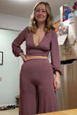 I wore these pants with the matching top on NYE and I felt chic and cozy! Stretchy fabric that hugs the curves. What was really awesome is that they were long enough for me! - Christina B.