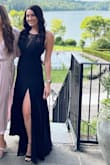 This dress is stunning!! The lace low V makes it the perfect mix of classy with a hint of sexy. It fits very true to size and doesn't stretch. I also didn't need a bra with it! I normally wear a 4/6 and the small fit me perfectly. - Nicole G.