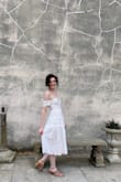 I ordered the smallest size available (XS) but still needed a lot of tailoring to get this to a point where it would fit/stay up (and we couldn't tailor it down perfectly due to the metal V in the neckline). Also, the lace will need to be ironed smooth or it will wrinkle to the point where it ends higher than the inner lining. It is not very easy to steam/iron.
The tailor pointed out that because of the metal V in the front, this style by nature will slip and fall down more often. It also is hard to tailor down as the metal V will poke out in a weird way when the other fabric is tightened. After tailoring it as far down as we really could it was still a smidge too loose and the metal pokes out somewhat weirdly. I also had subtle bra pads sewed in.
(I'm a 30B but Lulus website only lets me enter 32A). - Sara M.