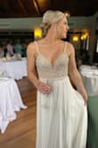 This dress was perfect for my destination wedding in Jamaica. It fit great and flowed so nicely throughout the night. It also photographed so well. I had a slit cut into the skirt for walking on the beach and loved making a small change to make it more personal. Highly recommend. - Mallory W.