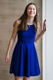 My daughter wore this for homecoming. The style now is super short, which HARD for the tall girls. This dress is so pretty and has a lot her length to it, so we had lots of needed length. We actually ended up hemming it about 3" to make it fit more like a short dress. The top fit really well too, but you should size your if you're above an A cup. She usually wears a medium, but the medium was too loose on top. - Erin R.