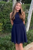 I bought this dress for my daughter that was attending a B'Nai Mitzvah. It arrived in time and fit perfectly. She looked gorgeous. - Carla L.
