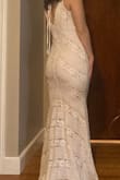 Really like this dress from the back, but not as sure of the stripes on the front and the straight line down the front looks a little odd. Really comfortable and easy to move in though. - Lydia C.