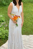 Beautiful unique dress with a flapper or Great Gatsby feel. Loved it but wasn't the style of my wedding. - Lydia C.