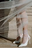 This heel is clean and modern. Its the perfect bridal shoe, and love that its so affordable! I personally styled with some tulle socks to give it an even more luxe look. - Ashlyn P.