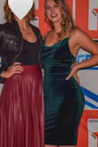 I wore this to my husband's annual work party and I think every single person there gave me a compliment! My husband could not keep his hands off me ;) I felt sexy but elegant in it--the dress is high enough in the back to where my spanx didn't show at all and I could even go bra-less if it wasn't so nippy out that night! It made me show off all of my favorite ASSets, while feeling extremely classy and beautiful. This velvet/velour is stretchy, so it curves in all the right places. GET THIS DRESS! I normally wear a M or L so I ordered both and kept large. - Kay B.