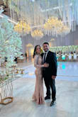 This is a stunning dress! I just had to adjust it a little bit but it fits perfectly! I receive a million compliments about the dress on the wedding night I wore it to! - Alejandra M.